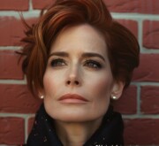 Elegant superior short red haircut for a woman