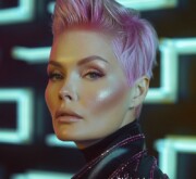 A breathtaking short colorful hairdo showcases bold creativity