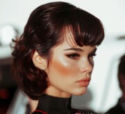A trendy short brown mind blowing haircut