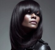 A bold long brown coif with sleek definition A bold long brown coif with sleek definition