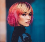 A chic and vibrant short colored hair look