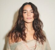 A chic long brown coif for sharp, defined beauty A chic long brown coif for sharp, defined beauty