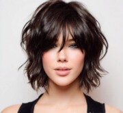 A defined short brown style with soft, natural shine