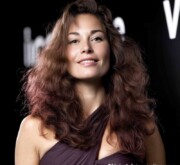 A modern long brown coif with soft detailing A modern long brown coif with soft detailing