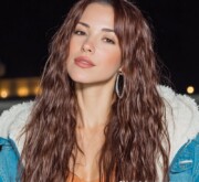 A sleek long brown hair female with natural volume A sleek long brown hair female with natural volume