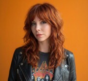 Bold stunning long red hairstyle glowing with life Bold stunning long red hairstyle glowing with life