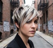Defined layers in short blonde coif Defined layers in short blonde coif