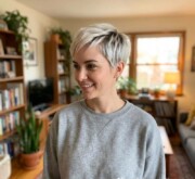 Fresh gorgeous short gray hairdo with polished shine