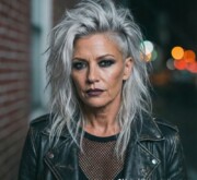 Fresh long gray coif for woman with sleek shine Fresh long gray coif for woman with sleek shine