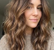 Long brown hip hairstyle with clean, sharp lines Long brown hip hairstyle with clean, sharp lines