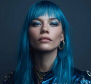 Long colorful hairdo glowing with passion Long colorful hairdo glowing with passion
