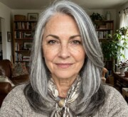 Long gray coif for woman with subtle volume Long gray coif for woman with subtle volume