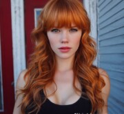 Long red hair the color of cosmic energy Long red hair the color of cosmic energy