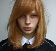 Medium length red hair filled with vitality Medium length red hair filled with vitality