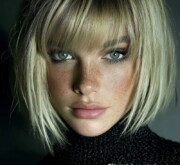 Short blonde female cut for a polished appearance