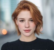 Short red hairdo, bold and glowing