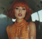 Short red hairdo, glowing bright