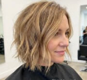 Soft layers in short blonde coif Soft layers in short blonde coif