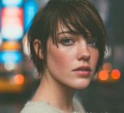 Subtle charm captured in this short brown style with defined layers Subtle charm captured in this short brown style with defined layers